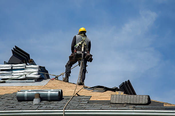 Professional Gutter Installation technician working in Fall River, MA